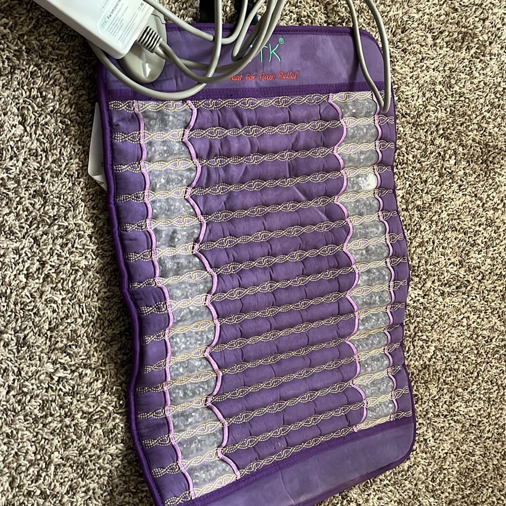 NEVER USED AMETHYST HEATING PAD